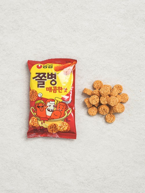 ขนมข้าวเกรียบ Nongshim มีรส เผ็ด โดยมีรสชาติที่จัดจ้านและเผ็ดร้อน 82กรัม
